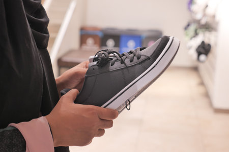 women choosing shoes at local storeの写真素材