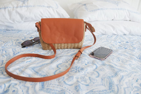 Hand made eco-friendly women bag on bedの写真素材