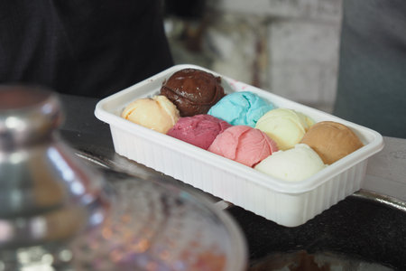 different flavor ice cream in a plastic container