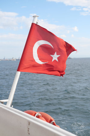 viewed from a boat with Turkish flagの写真素材