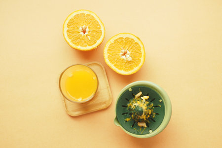 squeezing oranges into orange juice,の写真素材