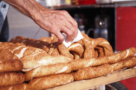 hand pick Turkish Bagel Simit selling in a vanの写真素材