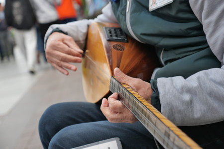 men playing traditional music instrument turkish saz