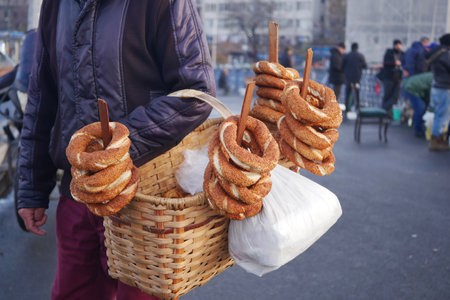 men selling Turkish Bagel Simit selling at streetの写真素材