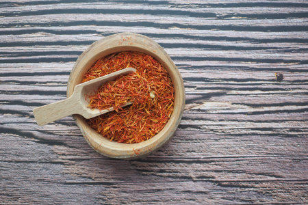 Saffron crocus in rustic gold bowl