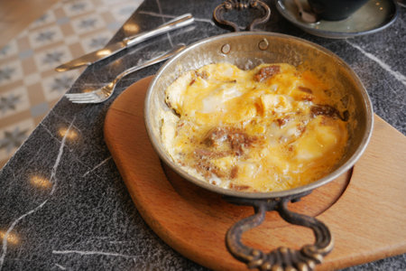 Egg Omelette with sausage on tableの写真素材