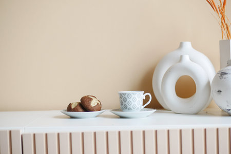 chocolate sweet cookies and coffee cup on decorative tableの写真素材