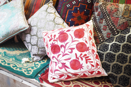 Colourful cushions on display for sale in a traditional Turkish Bazaar.の写真素材
