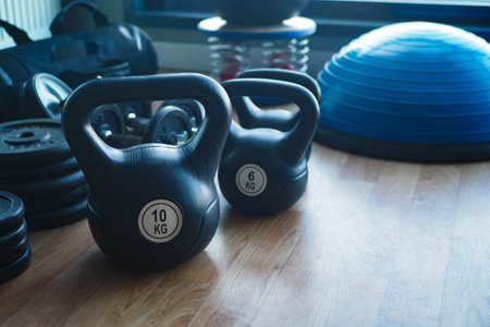 Gym Equipment or Dumbbell Kettlebell in a gym bench