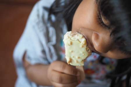 Child Hand Holding Ice Creamの写真素材