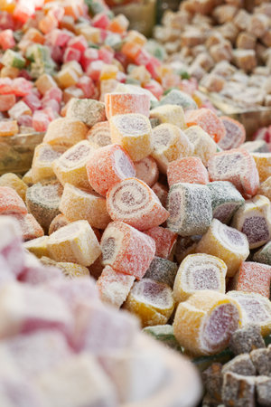 turkish delight or lokum of red, green, orange and yellow colors.の写真素材