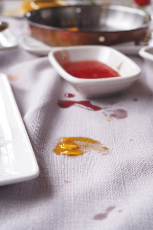 foods spilled over the breakfast table.の写真素材