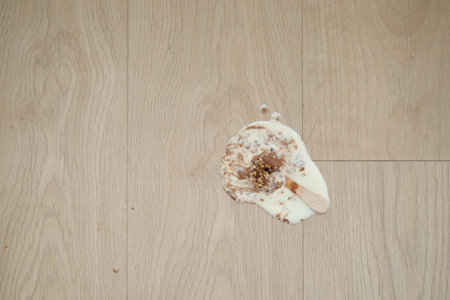 ice cream melting and spilling on floor ,の写真素材