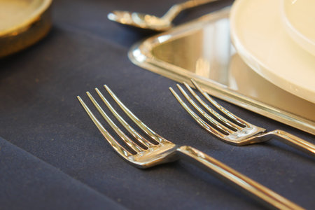 Shiny Silver Spoons on a Wooden Surface with Beautiful Reflections and Elegant Shine