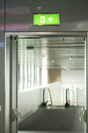 emergency exit door inside of a building at airport