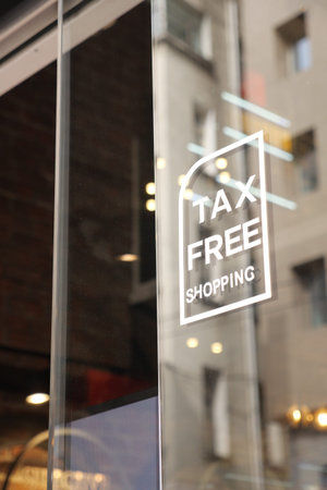 shop tax free text duty free shop sign on shop window