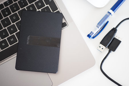 external hard drive on a laptopの写真素材
