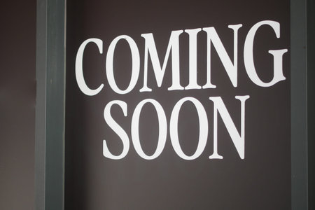 Highquality Coming Soon Sign Announcement on Dark Background for an Upcoming Eventの写真素材