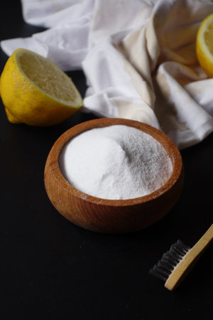 Baking soda and whole lemon on tableの写真素材