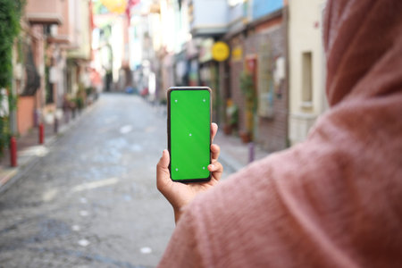 Person holding an smart phone at popular tourist destination