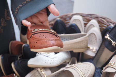 women choosing shoes at local storeの写真素材