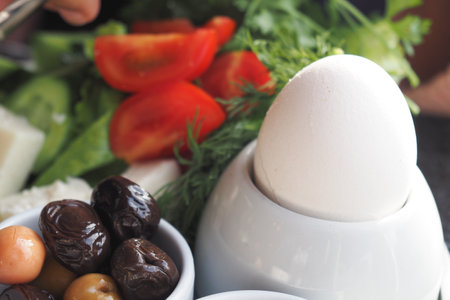 Close egg in cups for morning breakfastの写真素材