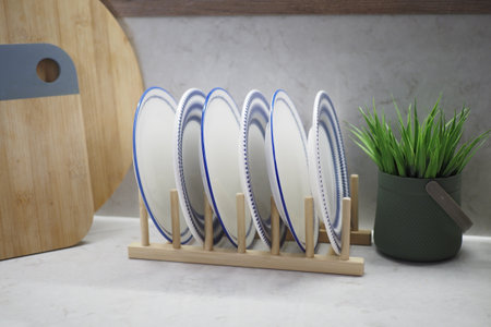 round bowl or ceramic plate on kitchen table.の写真素材