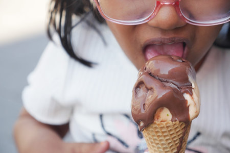 Child Hand Holding Ice Cream