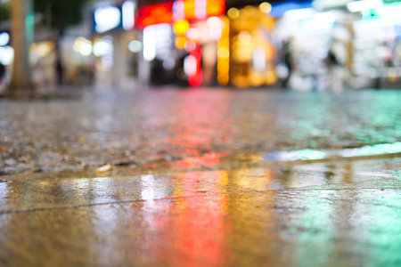 water drops on the rainy day. night view in the city, selective focus