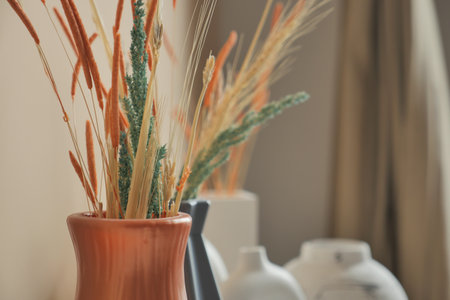 An elegant dried floral arrangement, beautifully displayed in a decorative vase for allの写真素材