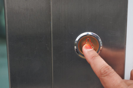 The man push lift button down.