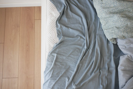 messy bed in early morning , messy bed after waking upの写真素材