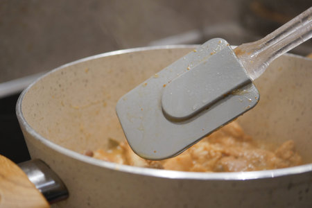 Cooking with a Silicone Spatula in a Pot is a delightful experience for any chef or food enthusiastの写真素材