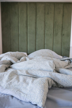 messy bed in early morning , messy bed after waking up