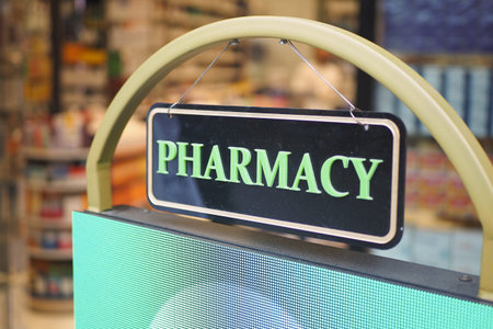 pharmacy sign on shop in streetの写真素材
