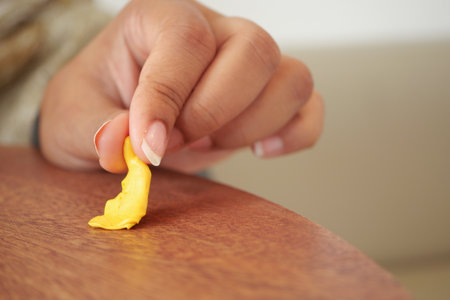 effectively removing chewing gum, with closeup view focusの写真素材