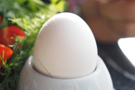 Close egg in cups for morning breakfastの写真素材