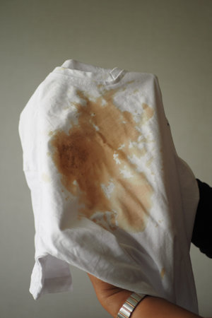 spilled coffee on a white shirt