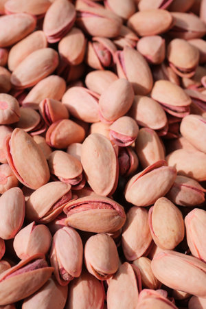 detail shot of pistachios nut on in bowlの写真素材