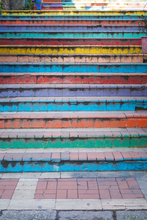 The Colorful and Artistically Painted Steps Located in a Vibrant Urban Environmentの写真素材