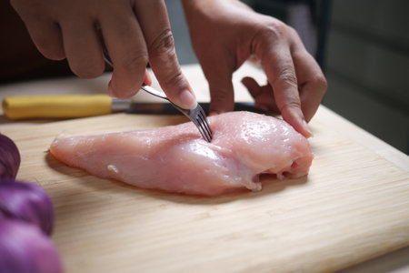 How to Properly Prepare Chicken Breast Before Cooking for a Delicious Meal Experienceの写真素材
