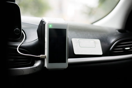 POS machine on yellow taxi