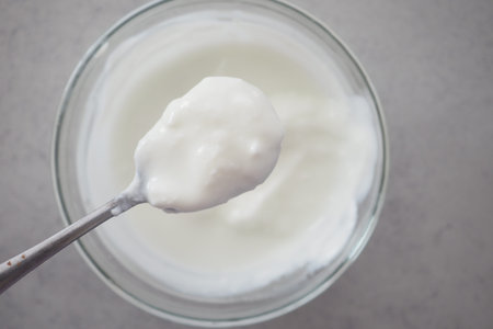 fresh yogurt in a bowl on table