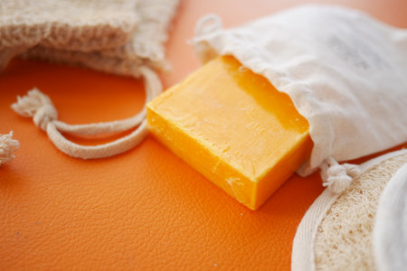 This is a Natural Orange Soap beautifully Wrapped in an EcoFriendly Bag for your convenienceの写真素材
