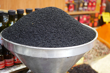 Close-Up of Black Sesame Seeds in a Market Displayの写真素材
