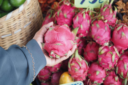 A Vibrant Fresh Dragon Fruit Displayed Beautifully at the Local Market for Everyoneの写真素材