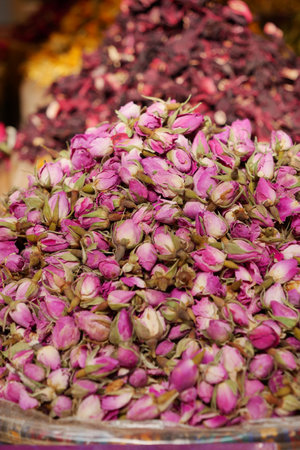 Dried Rose Buds Carefully Piled in a Charming Market Display for Sale and Enjoymentの写真素材