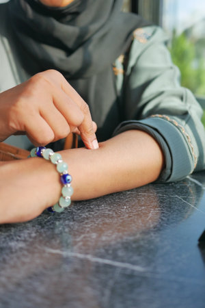 Bracelet on the female wrist.の写真素材
