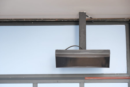 Modern electric infrared heater on celling