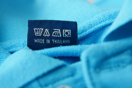Clothing label with care symbols on a clothの写真素材